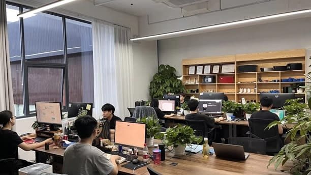 Peka R&D team working in an early-stage office environment during product development phase