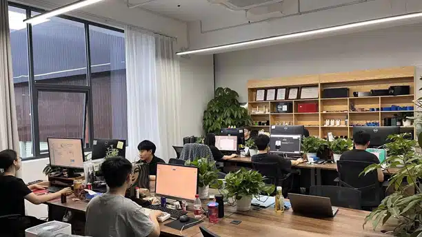 Peka R&D team working in an early-stage office environment during product development phase