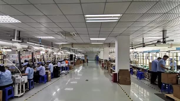 Inside view of Peka Power’s expanded lithium battery production line with technicians at work