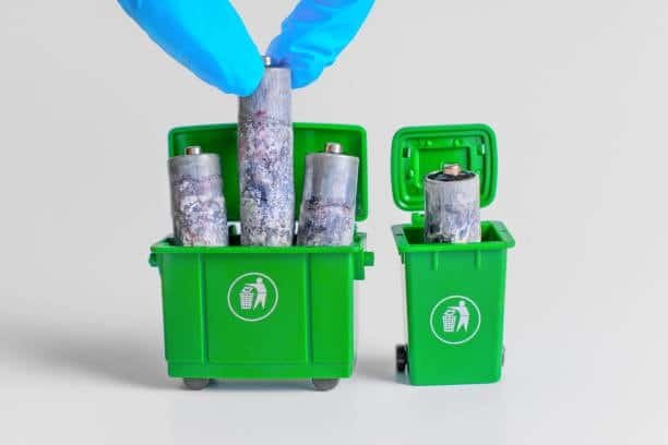 Disposing of old corroded batteries safely in recycling bins