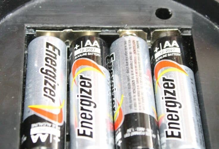 Energizer AA batteries displaying early corrosion linked to acid fumes