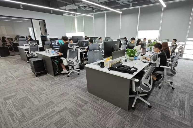 Peka Power’s support and engineering team working in a modern office environment