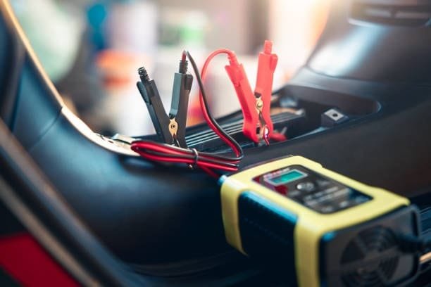 Charging AGM battery installed in vehicle using smart charger