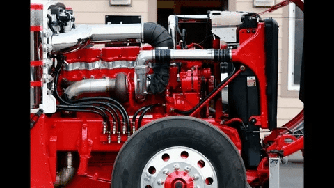 Side view of a Cummins diesel engine mounted in a truck, showcasing performance and engineering design.