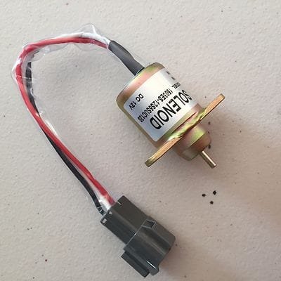 Diesel fuel shut off solenoid showing compact design and connector for easy engine installation.