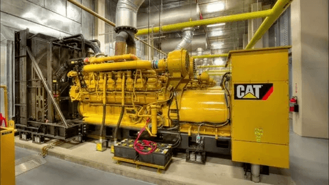 Large Caterpillar generator installed for industrial NFPA 110 compliance