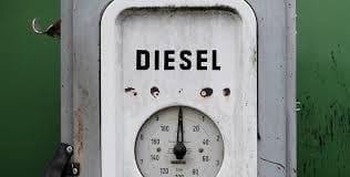 Old-style diesel fuel pump used to supply fuel for generators.