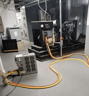 Load bank cables attached to generator for performance testing