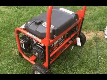 Husky 5000 watt portable generator running outdoors