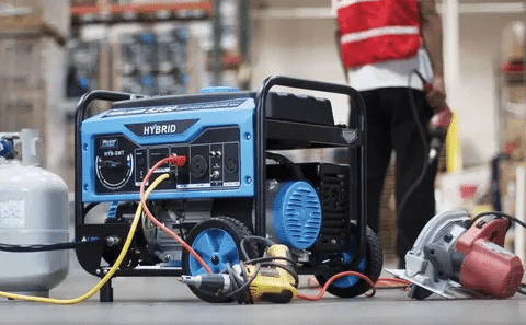 Hybrid 5000 watt generator connected to power tools and equipment