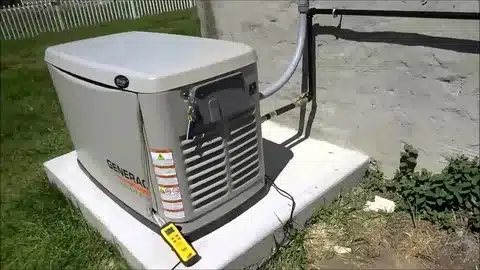 Standby generator installation with control panel connected to home system.