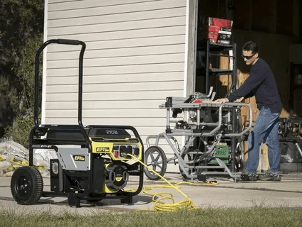 Man using a portable 7000 watt generator for outdoor power supply