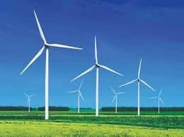 Wind turbine generator farm converting wind power into electricity.